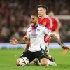 Tolisso e Ugarte no jogo entre Manchester United x Lyon
