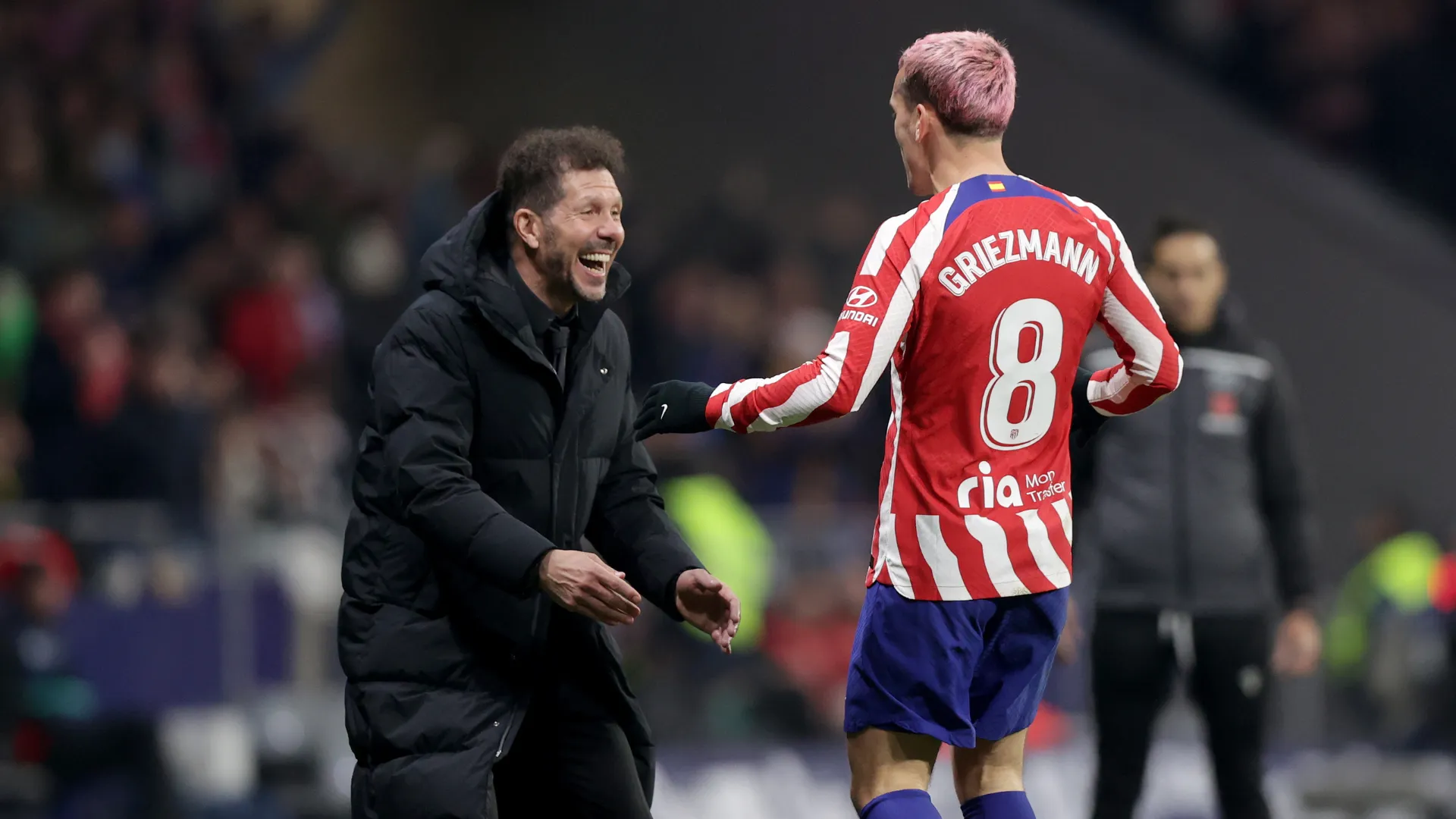 Griezmann comemora gol com Diego Simeone